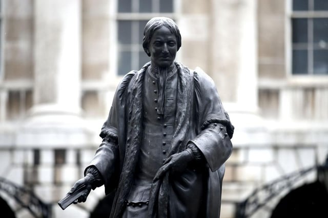 Thomas Guy founded Guy's Hospital in the 18th century and had shares in the South Sea Company which was involved in the slave trade. The hospital said that the statue would be removed, but not when