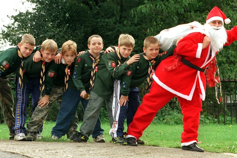 The 32nd Doncaster Armthorpe Scout Group held an Alternative Christmas Fayre at the Markham Main Sports & Social Club in Armthorpe in 1999 pictured is Father Xmas with from left scouts Chris Sands, Joseph Beggs, Andrew Menne ll, Michael Douglas, Michael Hewitt, Matthew Douglas