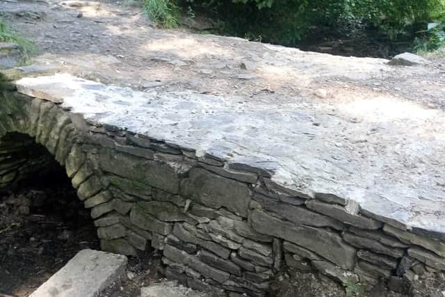 The 14th-century packhorse bridge at Graves Park, Sheffield after repairs damaged the structure