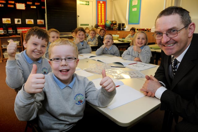 St Aloysius RC Primary School Federation headteacher Michael Gallagher, right, with pupils celebrating their Ofsted report. Remember this from 11 years ago?