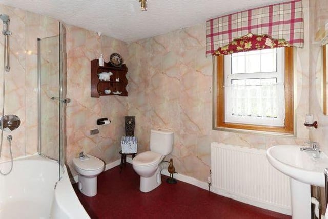 The property features a large family bathroom