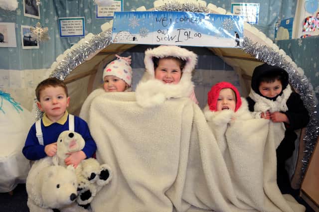Reception class pupils from Bishop Harland school in Sunderland made an igloo out of milk bottles as part of a learning initiative about the Arctic. Can you spot someone you know in this eight-year-old photo?