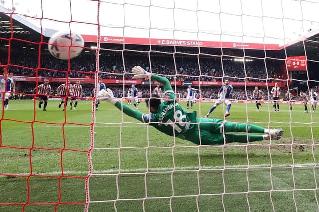 Blackburn Rovers' Ben Brereton scores his team first goal past Sheffield United's Wes Foderingham: DARREN STAPLES/AFP via Getty Images