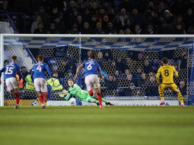 Alex Bass saved Alex Gilbey's penalty but failed to stop the rebound as the Dons equalised