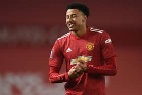 Manchester United's English midfielder Jesse Lingard gestures during the English FA Cup third round football match between Manchester United and Watford at Old Trafford. (Photo by OLI SCARFF/POOL/AFP via Getty Images)