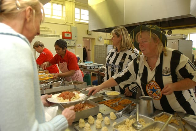 Dinner lady Janet Orrick serves up healthy meals at Lord Blyton School in 2005. Are you in the picture?