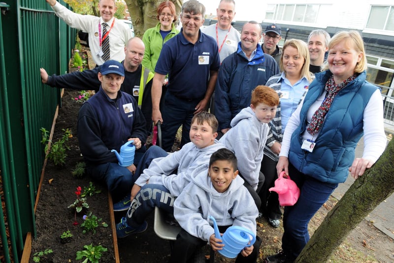 Epinay School gardening club members and volunteers taking part in Get Your Grown-up gardening day. Remember this from 7 years ago?