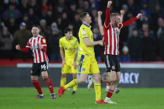 Oli McBurnie will be smiling again soon, according to Sheffield United manager Paul Heckingbottom: Simon Bellis / Sportimage