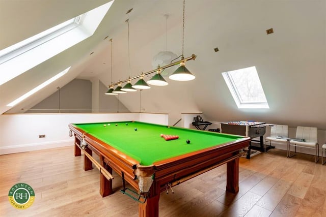 A galleried snooker room is part of the leisure suite.