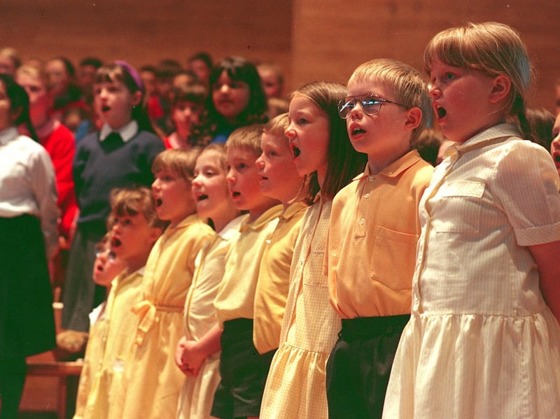 Singing loud and proud during the annual Schools Music Festival in the Guildhall, Preston in 1994