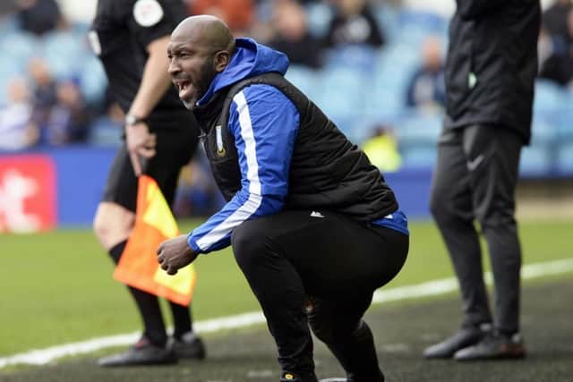 Darren Moore is capable of getting into the Sheffield Wednesday players when needed, according to Dennis Adeniran.