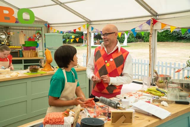 Judge Harry Hill with Oliver, aged 11, from Sheffield, on Junior Bake Off