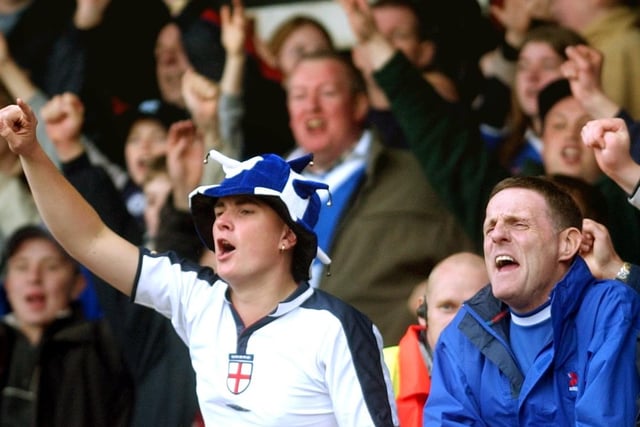 Chesterfield fans celebrate staying up in 2003.