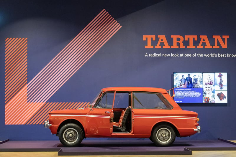 A Hillman Imp car with a retro tartan interior is part of the showcase of style and design. 