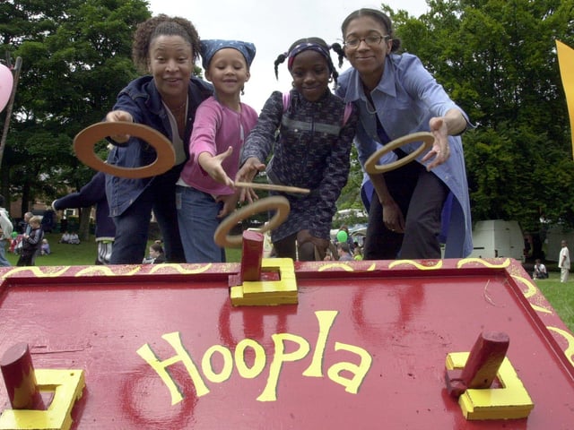 Having a go on the hoopla in aid of the children's project at the black women's resource centre are, left to right, Sharon Brown, Naoimi Coldwell, 6 , Kamara Thomas, 9 and Shannel Johnson. Picture taken at the 2001 Sheffield multi-cultural festival, Abbeyfield Park