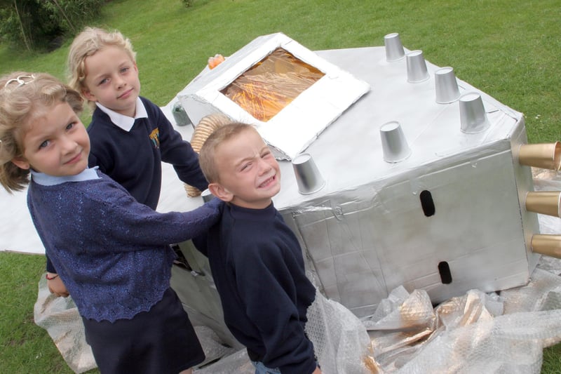 Laura Robinson, Todd Oldfield and Ryan Hogan enjoy the spaceship created during art week at Speedwell Infants School in Staveley in 2007.