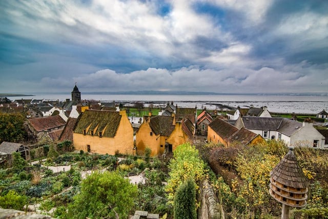 Used in several episodes of the hit TV series Outlander, the restored village is home to cobbled streets and red-roofed buildings.