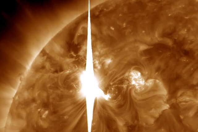 A NASA image showing a solar flare heading toward Earth - another is set to hit here this weekend, possibly causing communications disruption and power outages