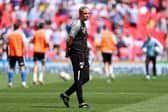 Michael Duff, manager of Barnsley, looks on during warm up prior to the Sky Bet League One Play-Off final between Barnsley and Sheffield Wednesday at Wembley Stadium on May 29, 2023 in London, England. (Photo by Catherine Ivill/Getty Images).