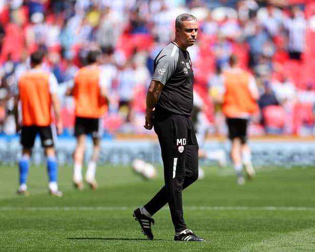 Michael Duff, manager of Barnsley, looks on during warm up prior to the Sky Bet League One Play-Off final between Barnsley and Sheffield Wednesday at Wembley Stadium on May 29, 2023 in London, England. (Photo by Catherine Ivill/Getty Images).