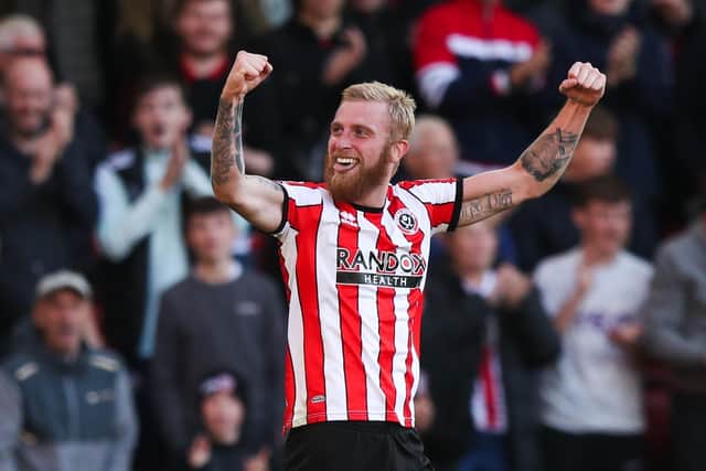 Sheffield United's Oli McBurnie is playing through the pain barrier: Isaac Parkin/PA Wire.