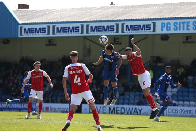Richard Wood of Rotherham United jumps for the ball with Ben Thompson of Gillingham during the Sky Bet League One match between Gillingham and Rotherham United at MEMS Priestfield Stadium on April 30, 2022 in Gillingham, England. (Photo by Henry Browne/Getty Images)
