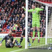 Dean Henderson of Sheffield United reacts after saving a shot from Mario Vrancic of Norwich City: Nigel Roddis/Getty Images