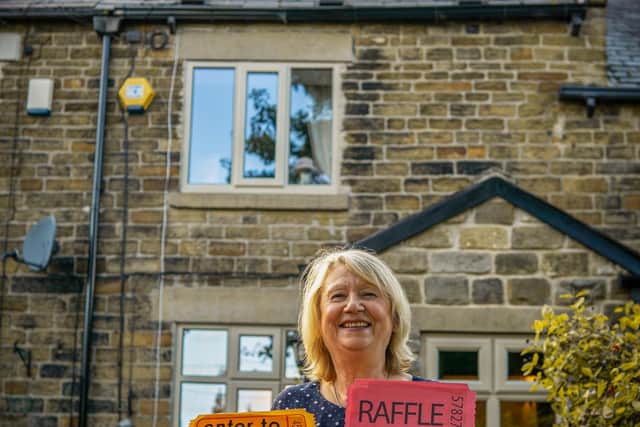 Tricia is raffling off her home to raise money for charity