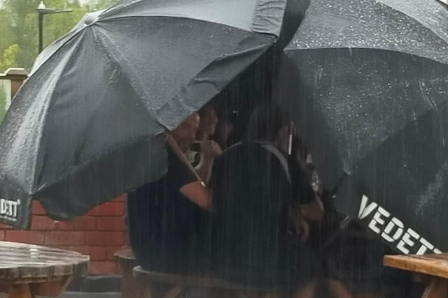 Hearty punters enjoy a pint in the rain at the Brothers Arms in Heeley. Picture courtesy of the Brothers Arms