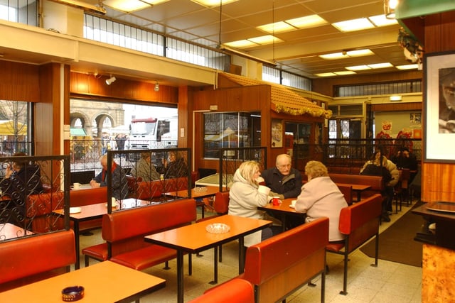 Regulars at Franchis enjoy a cuppa,  a sandwich and a chat in 2004.