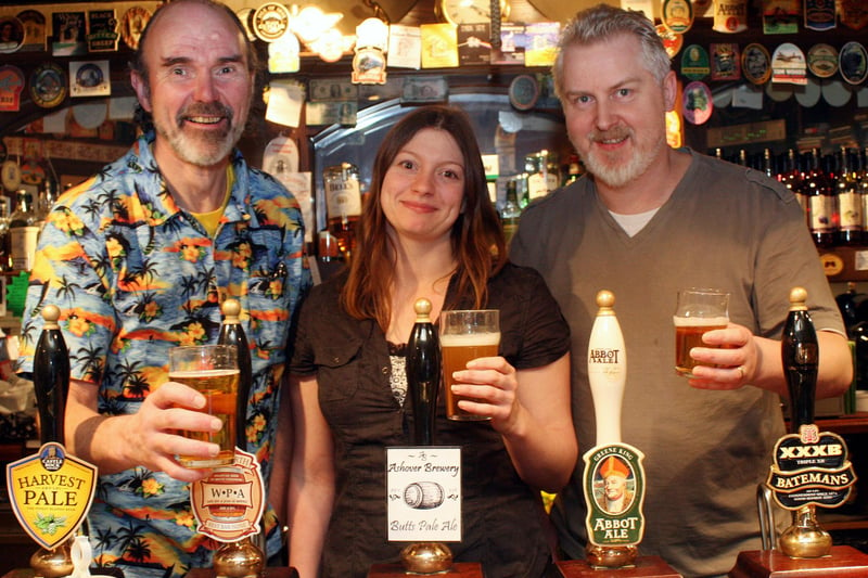 Brewers Roy and Janine Shorrock and landlord of the Old Poet's Corner Kim Beresford toast their success with their Butts Pale Ale, voted by drinkers as best beer out of 100 ales.