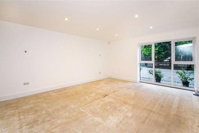 This second living room on the ground floor is above the living dining open plan area in the basement.