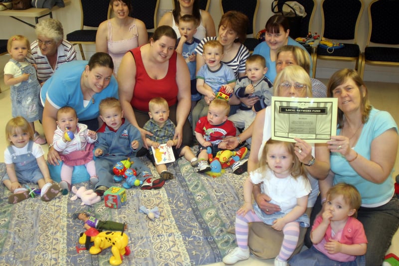 Bo Peep playgroup at Old Whittington, Chesterfield, receive a grant in 2006. Who do you know on the picture?