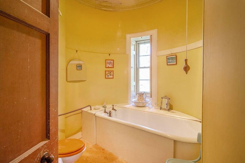 Bathroom within a turret.