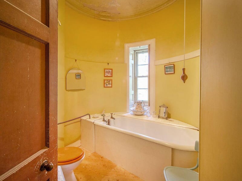 Bathroom within a turret.