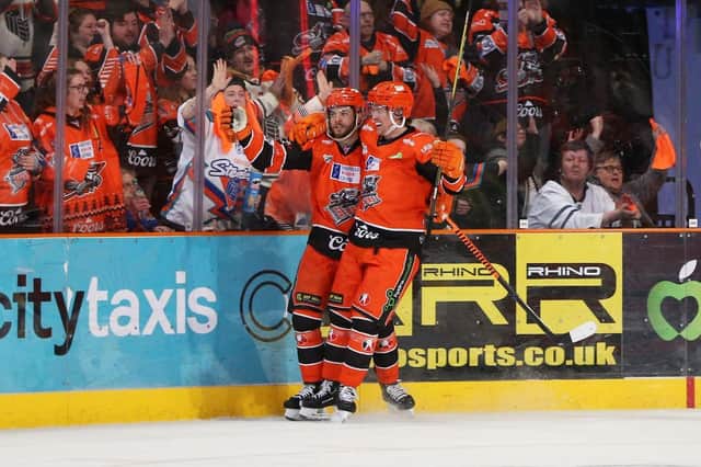 Robert Dowd celebrates scoring against Cardiff Devils. Picture: Hayley Roberts