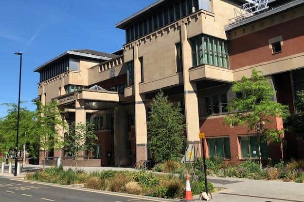 Sheffield Crown Court, pictured, has heard how two men have denied murdering a teenager who suffered stab wounds to his legs and died near Doncaster city centre.