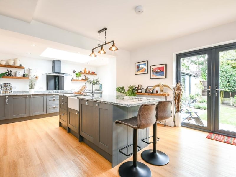 The Kitchen itself is an impressive size with space for a full-sized dining table and breakfast bar, beautiful granite worktops, a Belfast sink with a mixer tap over, a range of wall and base units along with a range of integrated appliances.