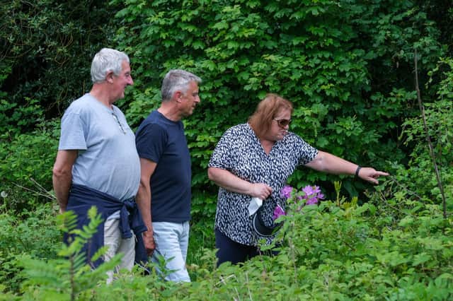 All Saints Church, Ecclesall open garden day Mike Ford, Rev Mark Brown and Fiona Ford discuss the planting.