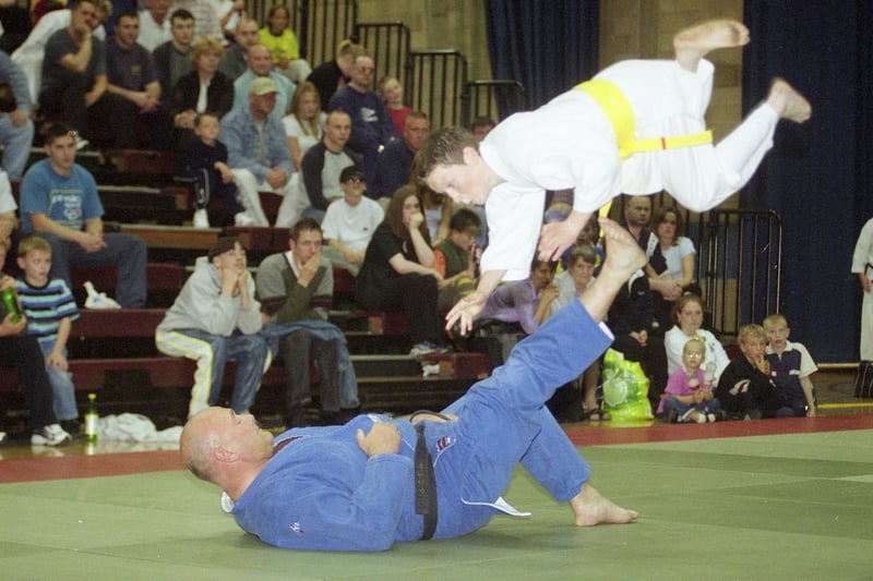 Martial arts experts demonstrate their skills at Sunderland's Crowtree Leisure Centre to raise money for Cancer Research in June 2001.