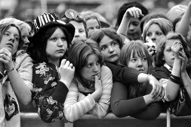 Teenage girls at a David Cassidy concert in May 1974 - security staff had to lift them over the barriers and some girls were hurt during the show.