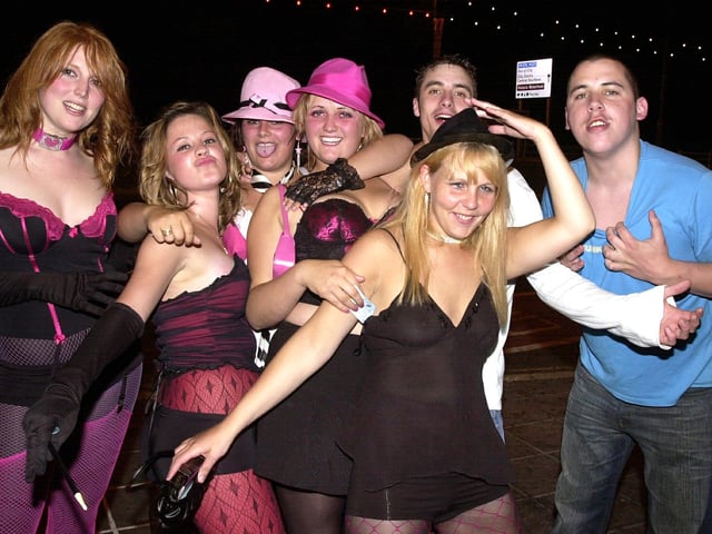 Revellers having a good time arriving outside the Envy nightclub at South Parade, Southsea - (042800-0091)