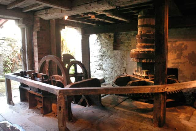 The old gearing running from the water wheel to the grinding gear at the snuff mill