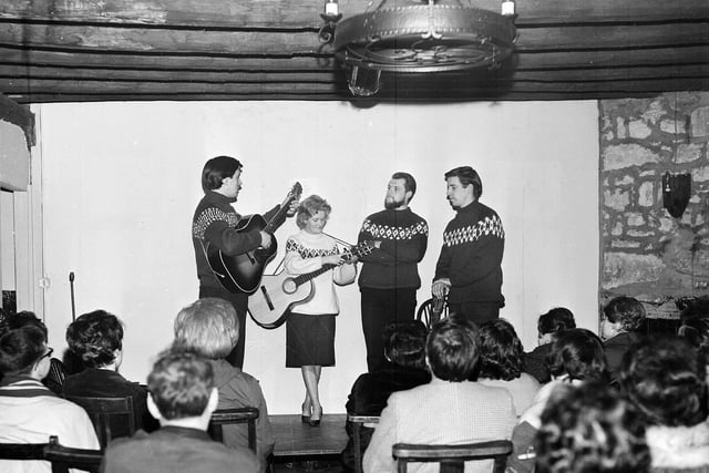 The Corrie Folk Trio and Paddie Bell singing at Pilton's Tryst Coffee House in March 1963.