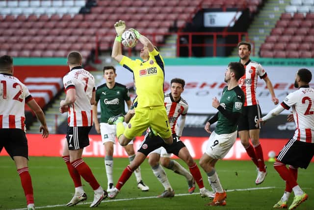 Sheffield United goalkeeper Aaron Ramsdale attempts  to claim a cross against Plymouth:  Tim Goode/PA Wire.