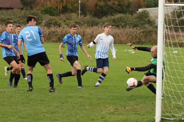 AFC Eastney Reserves net again in their 13-0 Adelaide Cup win over King George Rovers. Picture: Kevin Shipp