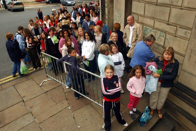 Young hopefuls queue round the corner waiting for their chance at the Stars in Their Eyes: Kids auditions at Sheffield City Hall in August 2003