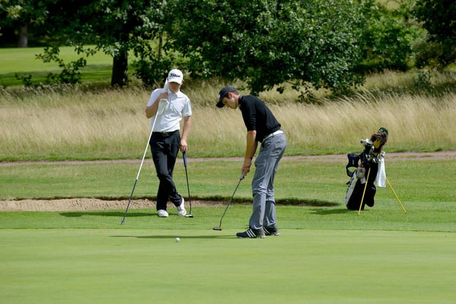 A golfer looks to sink a put. Did you ever compete at this event? Send us your pics if so.