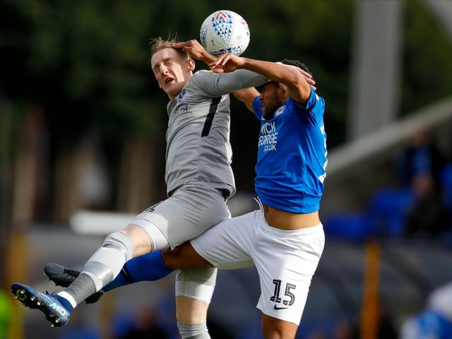 Ronan Curtis battles with Nathan Thompson