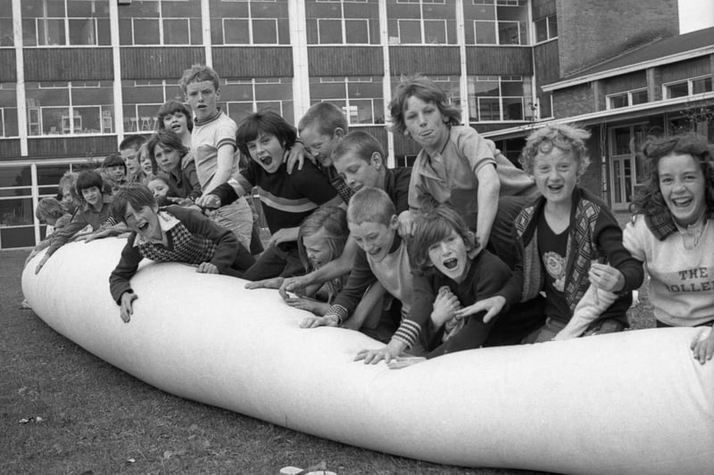 Playing on the inflatable balloon at the Castletown play scheme in 1975.